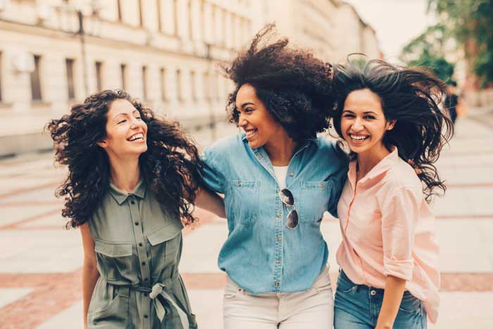group of three laughing women